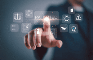 Business professional touching digital patented icon surrounded by copyright, legal scales, and IP protection symbols representing the difference between utility and design patents