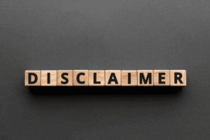 Wooden blocks spelling DISCLAIMER representing USPTO trademark disclaimer requirement in U.S. trademark registration process