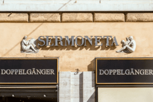 Retail storefront displaying a business name, illustrating trademark rights and businesses using similar names in different states.